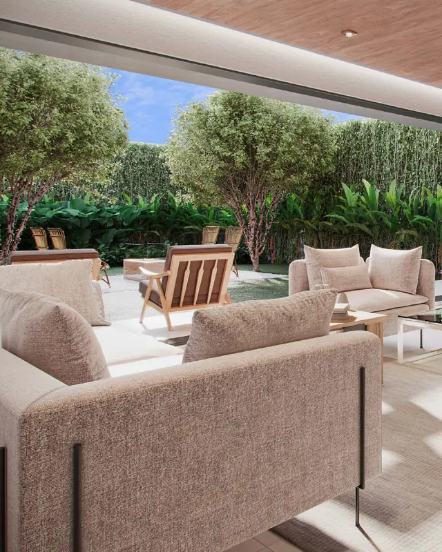 Perspectiva do living aberto para o jardim